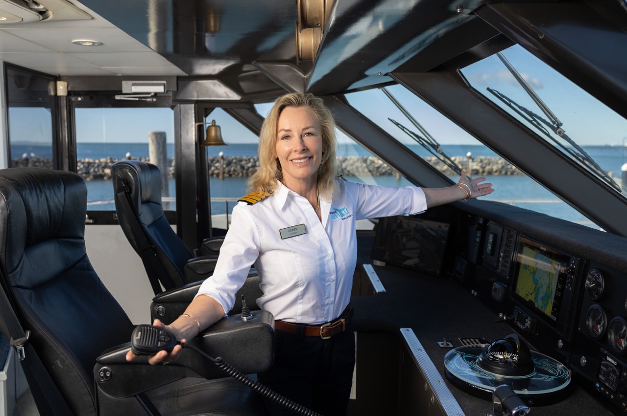 Captain Kerry Lopez aboard a Brisbane Whale Watching vessel preparing for the Queensland whale watching season.