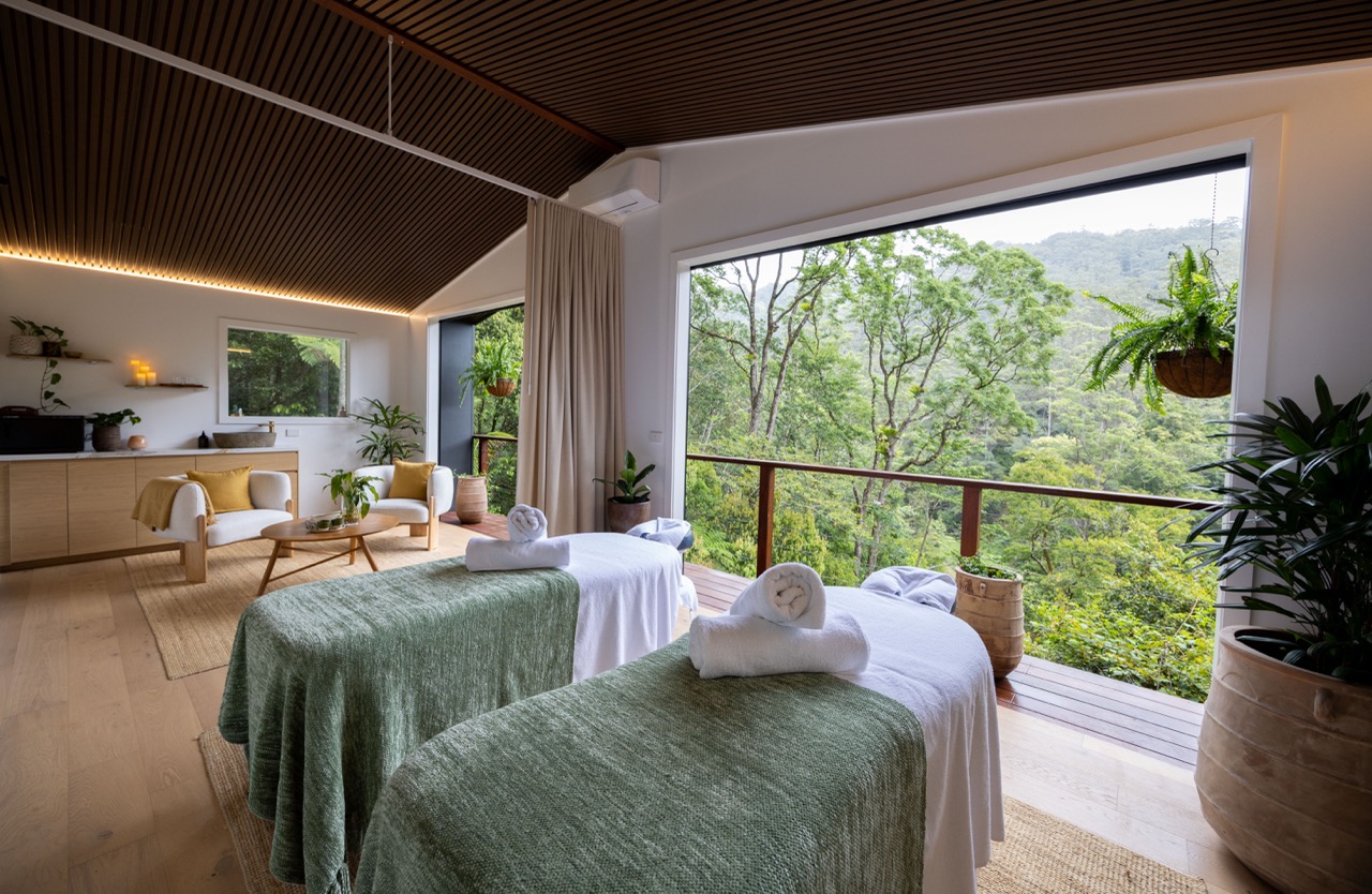 Couples massage tables in the Eden Treehouse at Eden Retreat, overlooking Currumbin Valley rainforest
