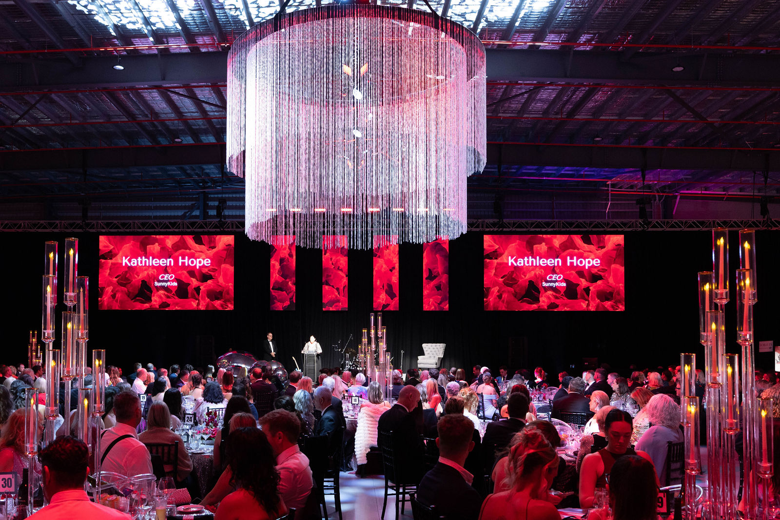 SunnyKids Mayoral Ball guests in the Machjet International hangar at Sunshine Coast Airport